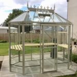 Small white pointy greenhouse